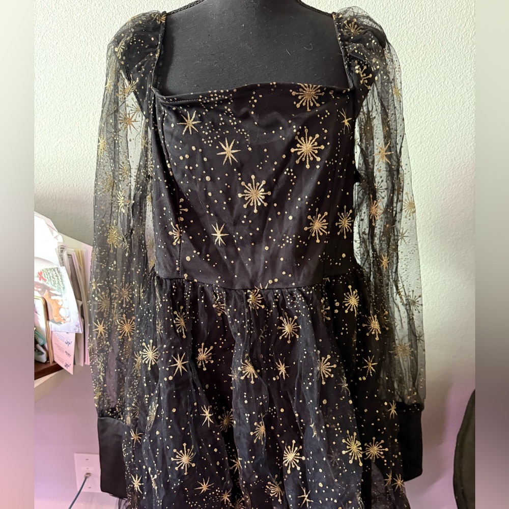 Black dress with gold stars